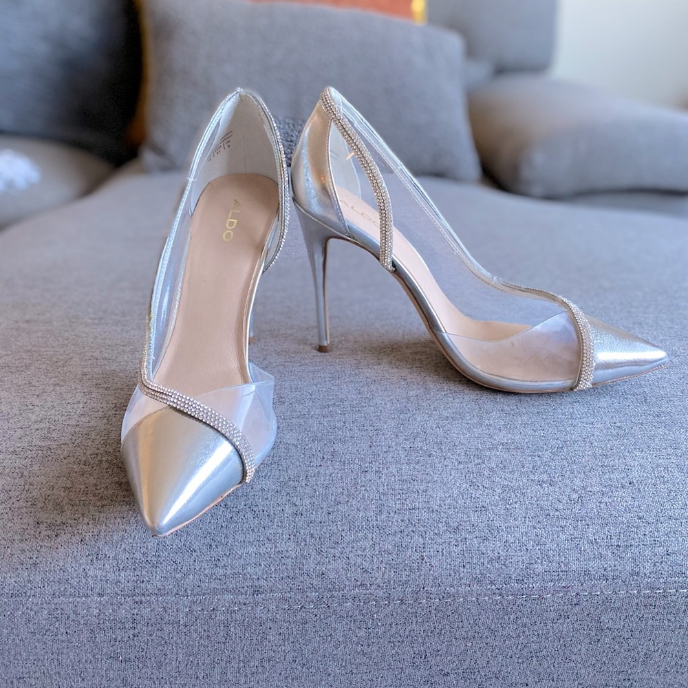 Gentle wore Aldo silver wedding shoes. Size 10. Wore one time.